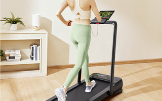 A woman running on a UREVO Strol 2S Pro Treadmill in a cozy home setting.