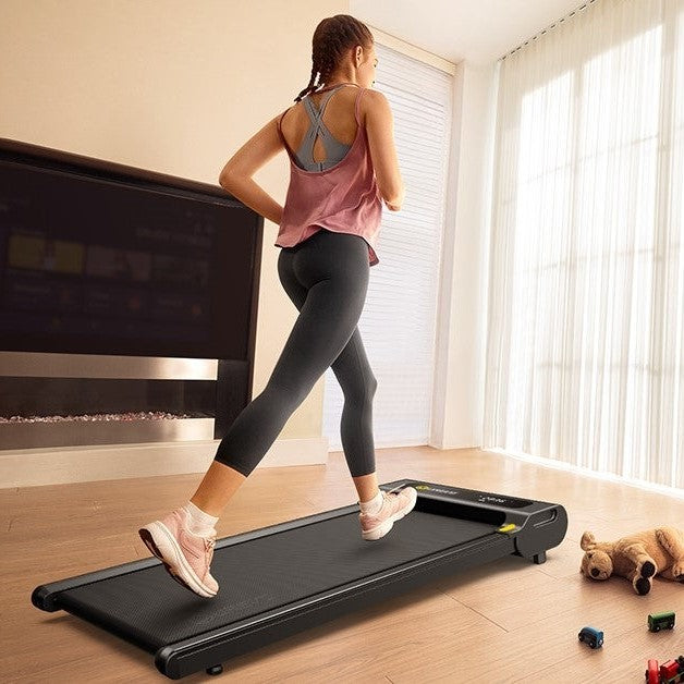 Woman Striding on Urevo Walking Pad at Home