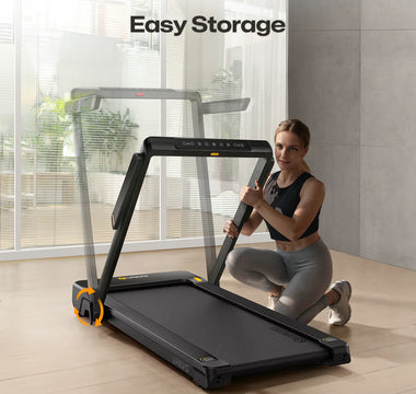 A woman is kneeling next to a UREVO Strol 1 Pro treadmill, demonstrating its easy storage feature in a modern living space.